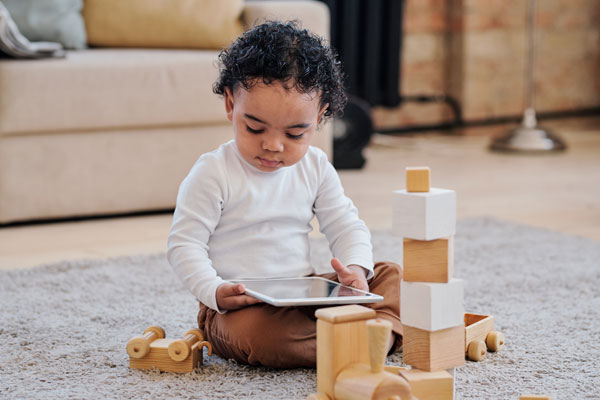 Toddler with building blocks