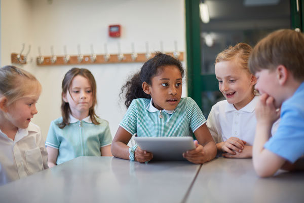 Infant school children in classroom